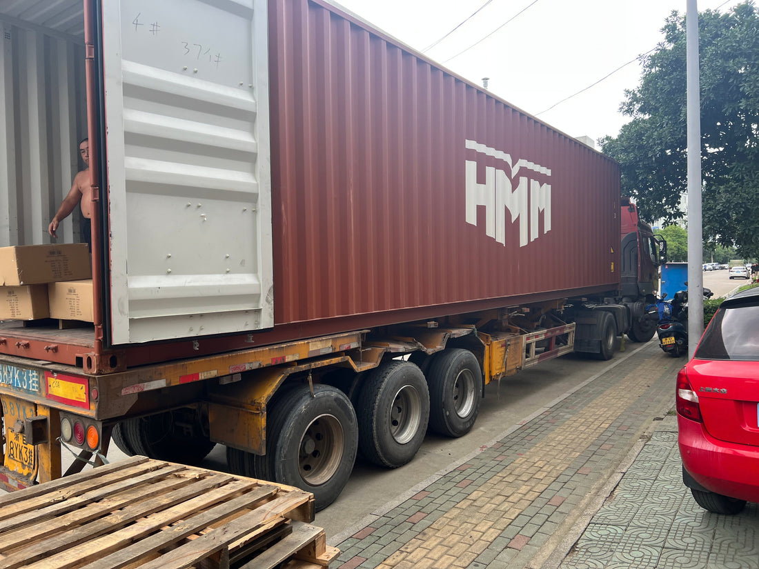 Bulk order shipment of REKTO outdoor gear ready on pallets in Ningbo warehouse